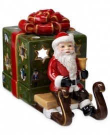 Santa Claus carries a brilliant surprise on the back of his sleigh in this beautifully crafted candle holder from Villeroy & Boch. Light shines through pierced stars in a present wrapped in charming vintage style. Santa Claus carries a brilliant surprise on the back of his sleigh in this beautifully crafted candle holder from Villeroy & Boch. Light shines through pierced stars in a present wrapped in charming vintage style.