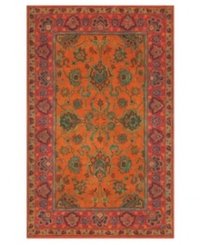 Drawing inspiration from the sandy ruins of ancient Petra and the traditional designs of India, this elegant, hand-tufted rug presents a rich decorative history set against a subtle red backdrop and accented with multiple gold and orange tones. Drawing inspiration from the sandy ruins of ancient Petra and the traditional designs of India, this elegant, hand-tufted rug presents a rich decorative history set against a subtle red backdrop and accented with multiple gold and orange tones.