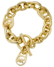 Add a touch of designer to your style. Michael Kors MK logo lock bracelet features a gold tone mixed metal setting with a trendy toggle clasp. Approximate length: 8 inches.