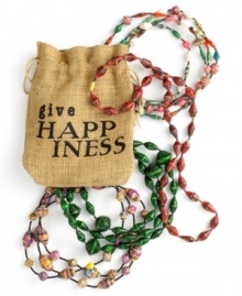 Happiness is in the bag with this double-stranded necklace, lovingly handcrafted in Rwanda. Colorful paper is cleverly re-purposed, rolled into all shapes and sizes then strung between tiny glass seed beads. Give to a friend or wear them all in one bold, meaningful statement. (Clearance) Happiness is in the bag with this double-stranded necklace, lovingly handcrafted in Rwanda. Colorful paper is cleverly re-purposed, rolled into all shapes and sizes then strung between tiny glass seed beads. Give to a friend or wear them all in one bold, meaningful statement. (Clearance)