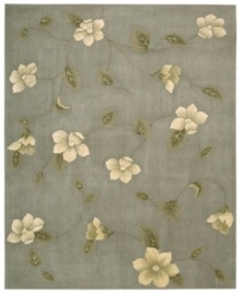 Floral appeal. Gracefully designed with delicate blossoms against a grey-blue ground, this area rug is hand tufted and hand carved from only the finest premium wool, then expertly washed to lend the surface a handsome luster, texture and sheen. Floral appeal. Gracefully designed with delicate blossoms against a grey-blue ground, this area rug is hand tufted and hand carved from only the finest premium wool, then expertly washed to lend the surface a handsome luster, texture and sheen.