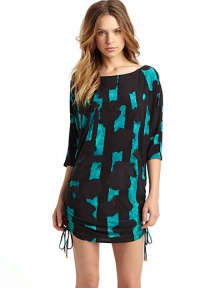 THE LOOKAbstract print, alloverThree-quarter length sleevesShirred detail along sides with tie closurePullover styleTHE MATERIAL92% nylon/8% spandexFully linedCARE & ORIGINHand washImportedModel shown is 5'9 (175cm) wearing US size Small. 