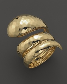 Hammered 18K gold band in a serpentine shape. By Roberto Coin.