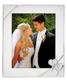 Preserve a cherished moment of your own or treat your favorite newlyweds to the True Love picture frame. Interlocking hearts adorn elegant silver plate, a beautiful showcase for wedding or honeymoon photos. Qualifies for Rebate Preserve a cherished moment of your own or treat your favorite newlyweds to the True Love picture frame. Interlocking hearts adorn elegant silver plate, a beautiful showcase for wedding or honeymoon photos. Qualifies for Rebate