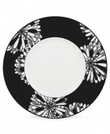 A graphic, kaleidoscope-inspired design featuring the timeless shades of black and white lends any gathering sophistication. A graphic, kaleidoscope-inspired design featuring the timeless shades of black and white lends any gathering sophistication.