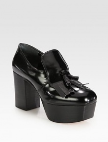 A chunky stacked platform and heel heighten this traditional oxford essential with twin tassels. Stacked heel, 3½ (90mm)Stacked platform, 1¾ (45mm)Compares to a 1¾ heel (45mm)Leather upperLeather lining and solePadded insoleMade in Italy A chunky stacked platform and heel heighten this traditional oxford essential with twin tassels. Stacked heel, 3½ (90mm)Stacked platform, 1¾ (45mm)Compares to a 1¾ heel (45mm)Leather upperLeather lining and solePadded insoleMade in Italy