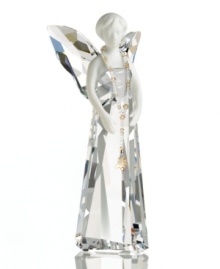 A perfect harmony of fine porcelain and exquisite crystal, the Alina angel figurine from Swarovski accents holiday homes with ethereal beauty. A perfect harmony of fine porcelain and exquisite crystal, the Alina angel figurine from Swarovski accents holiday homes with ethereal beauty.