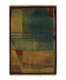 Radiating an abstract beauty, this round rug features overlapping planes with a triple stripe accent cutting across the composition. Soft greens, blues, golds and reds blend into each other with a soft luminosity, framed with a rich crimson border. Radiating an abstract beauty, this round rug features overlapping planes with a triple stripe accent cutting across the composition. Soft greens, blues, golds and reds blend into each other with a soft luminosity, framed with a rich crimson border.