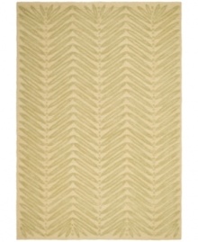A herringbone pattern of leaves creates a fresh look for the modern home in this unique area rug from Martha Stewart rugs. Hand tufted in India of long wool fibers, this luxurious home accent presents unparalleled comfort and style underfoot. A herringbone pattern of leaves creates a fresh look for the modern home in this unique area rug from Martha Stewart rugs. Hand tufted in India of long wool fibers, this luxurious home accent presents unparalleled comfort and style underfoot.