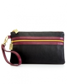 Cool and contemporary, this perfectly portable design from Style&co. adds understated style to any ensemble. Shiny patent leather is outfitted with gleaming signature hardware for an undecidedly luxe look, while the surprisingly spacious interior offers room for phone, cash, keys and makeup.
