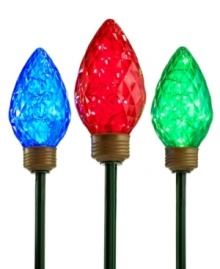 Light the way. Glowing in blue, red and green, Kurt Adler's bulb lawn stakes brighten your yard for the holiday. Light the way. Glowing in blue, red and green, Kurt Adler's bulb lawn stakes brighten your yard for the holiday.