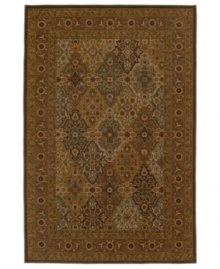 A traditional panel design is woven of supreme New Zealand wool in the Ellsworth area rug in antique tones of mocha, brown, celadon and beige for a truly rich addition to old-world interiors. Made in the USA. A traditional panel design is woven of supreme New Zealand wool in the Ellsworth area rug in antique tones of mocha, brown, celadon and beige for a truly rich addition to old-world interiors. Made in the USA.