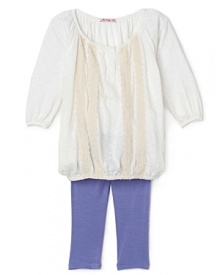With a loose-fitting top that gathers at the sleeve and hem, this generous tunic pairs perfectly with the understated legging. With a loose-fitting top that gathers at the sleeve and hem, this generous tunic pairs perfectly with the understated legging.