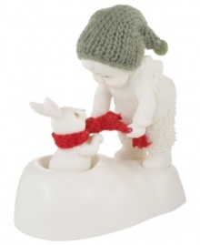 A tiny baby offers his scarf to a friend in need in this Snowbabies figurine. Crafted of porcelain bisque from Department 56. A tiny baby offers his scarf to a friend in need in this Snowbabies figurine. Crafted of porcelain bisque from Department 56.