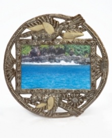 Joyful birds take flight in the hands of Haiti's skilled metalwork artists, who cut, hammer and varnish raw, recycled steel into the amazingly detailed and delicately crafted Golden Bird picture frame. Joyful birds take flight in the hands of Haiti's skilled metalwork artists, who cut, hammer and varnish raw, recycled steel into the amazingly detailed and delicately crafted Golden Bird picture frame.