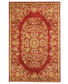 Rich in both tone and tradition, this exquisite Safavieh area rug creates a unforgettable focal point with a vine-and-blossom motif that coils beautifully against a striking red background. Tufted in India from pure wool, this rug adds incredible allure to any space. (Clearance) Rich in both tone and tradition, this exquisite Safavieh area rug creates a unforgettable focal point with a vine-and-blossom motif that coils beautifully against a striking red background. Tufted in India from pure wool, this rug adds incredible allure to any space. (Clearance)