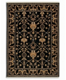 Graceful gold-beige designs add magnetic appeal to this deep-black area rug. Karastan's signature luster-wash gives the piece an exceptionally soft hand, while also enhancing the richness of the colors. Woven from plush New Zealand wool. Cotton foundation. Graceful gold-beige designs add magnetic appeal to this deep-black area rug. Karastan's signature luster-wash gives the piece an exceptionally soft hand, while also enhancing the richness of the colors. Woven from plush New Zealand wool. Cotton foundation.