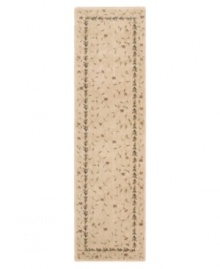 A beautiful lattice of delicate vines and blooming flowers gives this rug its magnetic charm. On a light beige ground with soft accents of red and blue, this densely woven piece invites you into wonderful interior decor. A beautiful lattice of delicate vines and blooming flowers gives this rug its magnetic charm. On a light beige ground with soft accents of red and blue, this densely woven piece invites you into wonderful interior decor.