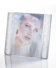 Make your memories shine even brighter with the Starlet picture frame. Sparkling Swarovski crystals on each side of the frame put your photo on dazzling display. Make your memories shine even brighter with the Starlet picture frame. Sparkling Swarovski crystals on each side of the frame put your photo on dazzling display.