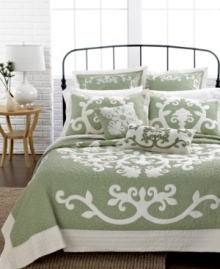 Serene green dream. With a look of whimsical beauty, this Aliani quilt boasts a luxurious landscape of embroidery with fluid flourish designs. Pair with coordinating shams and decorative pillows for the full effect. Serene green dream. With a look of whimsical beauty, this Aliani quilt boasts a luxurious landscape of embroidery with fluid flourish designs. Pair with coordinating shams and decorative pillows for the full effect.