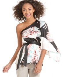 XOXO's casual top amps things up with a one-shoulder neckline. Pair it with skinny jeans for super-cute, date night look! XOXO's casual top amps things up with a one-shoulder neckline. Pair it with skinny jeans for super-cute, date night look!