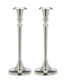 Cast your home in a more beautiful light with Godinger candlesticks. A classic tulip shape defines a polished aluminum pair to accentuate any setting. Cast your home in a more beautiful light with Godinger candlesticks. A classic tulip shape defines a polished aluminum pair to accentuate any setting.