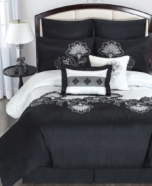 A dramatic black and white palette gives this Esme comforter set a chic and sophisticated look. Embellished with a modern floral pattern, striped accents and a lustrous sheen, these set makes a full impact in the bedroom. A dramatic black and white palette gives this Esme comforter set a chic and sophisticated look. Embellished with a modern floral pattern, striped accents and a lustrous sheen, these set makes a full impact in the bedroom.
