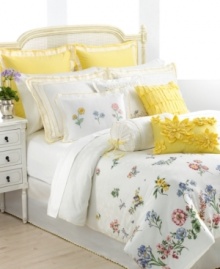 Sculpted of pure cotton, this decorative pillow from Lenox features a series of embroidered flowers and a delicate scalloped edge in daffodil yellow. So graceful and elegant, this pillow enhances the charming Flowering Meadow bedding collection. Sculpted of pure cotton, this decorative pillow from Lenox features a series of embroidered flowers and a delicate scalloped edge in daffodil yellow. So graceful and elegant, this pillow enhances the charming Flowering Meadow bedding collection.
