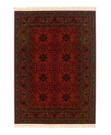 Give an air of prosperity to any room with the ornate Kashimar Nomad Red rug. Woven of pure New Zealand semi-worsted wool to create a dense, lustrous feel while Couristan's locked-in-weave power-loom construction secures each individual strand of yarn into an upright position for a brilliant finish. Give an air of prosperity to any room with the ornate Kashimar Nomad Red rug. Woven of pure New Zealand semi-worsted wool to create a dense, lustrous feel while Couristan's locked-in-weave power-loom construction secures each individual strand of yarn into an upright position for a brilliant finish.