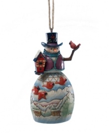 With details that recall American folk art, Jim Shore's snowman and cardinal ornament will become a beloved addition to your holiday collection. With details that recall American folk art, Jim Shore's snowman and cardinal ornament will become a beloved addition to your holiday collection.