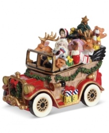 Full or surprises, St. Nick hits the road, piling Donner and Blitzen, teddy bears and toy planes into a classic car from Fitz and Floyd. Full or surprises, St. Nick hits the road, piling Donner and Blitzen, teddy bears and toy planes into a classic car from Fitz and Floyd.