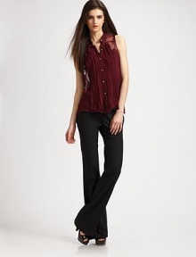 Front pleats and slight flare construction enhance this classic, wool-rich look. Hidden button front Zip fly Front pleats Back besom pockets Inseams, about 33 96% wool/4% Lycra Dry clean Made in USA of imported fabric