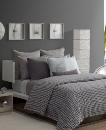 The Ombrone sheet set from Lacoste is comprised of luxurious 440-thread count white cotton sateen. The flat sheet and pillowcases feature a self hem with contrasting silver cloud piping for a sleek finish to this ultra-modern look. The Ombrone sheet set from Lacoste is comprised of luxurious 440-thread count white cotton sateen. The flat sheet and pillowcases feature a self hem with contrasting silver cloud piping for a sleek finish to this ultra-modern look.