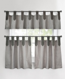 A stylish way to show your stripes. The tab-top design of the Ticking Stripe café curtain accents the classic stripe pattern with casual, chic flair. Featuring pure cotton. A stylish way to show your stripes. The tab-top design of the Ticking Stripe café curtain accents the classic stripe pattern with casual, chic flair. Featuring pure cotton.