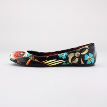 A great find for updating your one of a kind style, this amusing women's flat features a slip-on construction, distinctive printed upper and rounded toe. Imported. A great find for updating your one of a kind style, this amusing women's flat features a slip-on construction, distinctive printed upper and rounded toe. Imported.