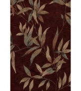 Add subtle drama to your living space with the beautifully luxe look of Dalyn's Studio rug. A lush, leafy motif adorns the cinnamon-hued rug, while hand-tufting lends incredibly plush texture. Durable weave is perfect for high-traffic areas.